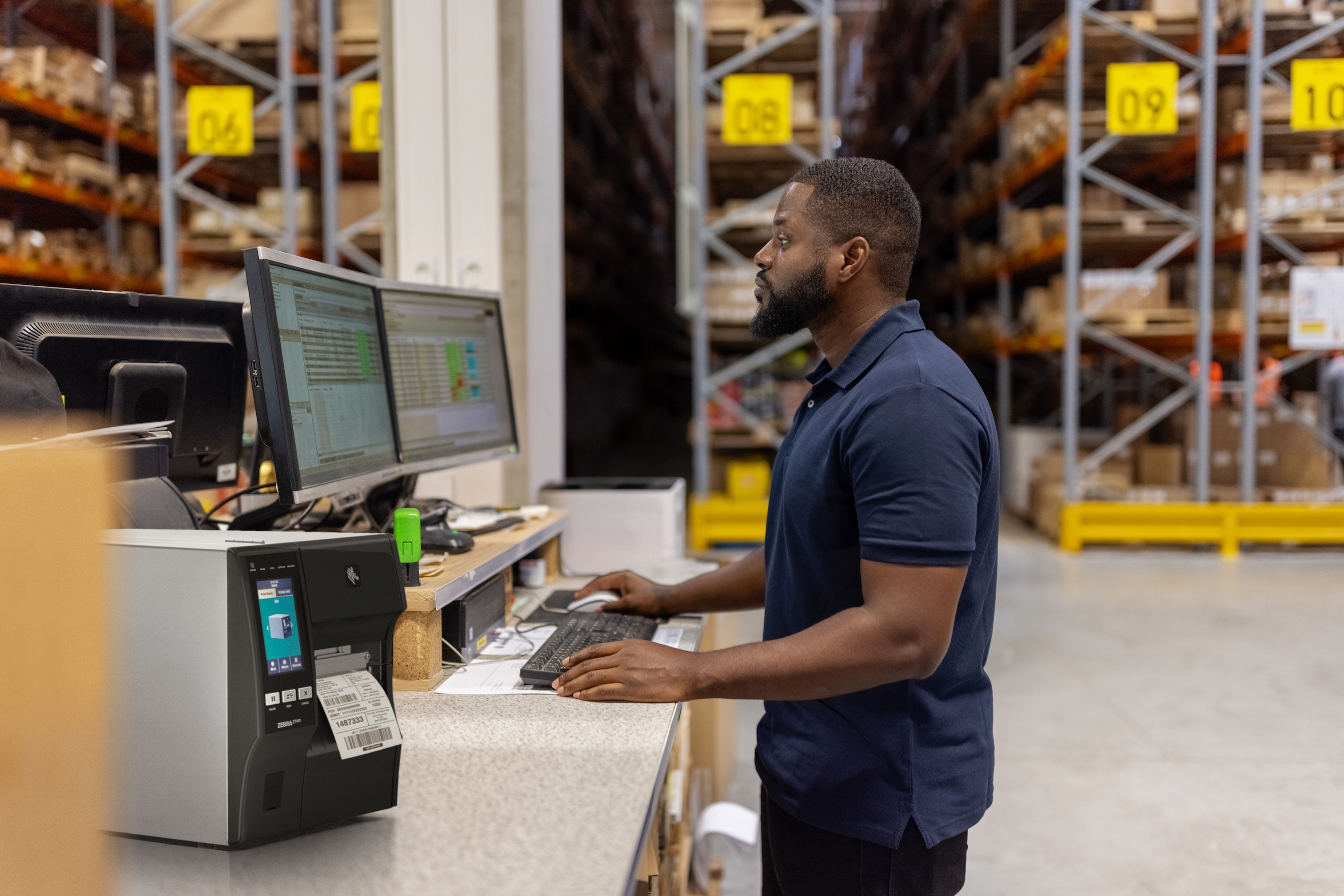 Warehouse worker using Zebra device